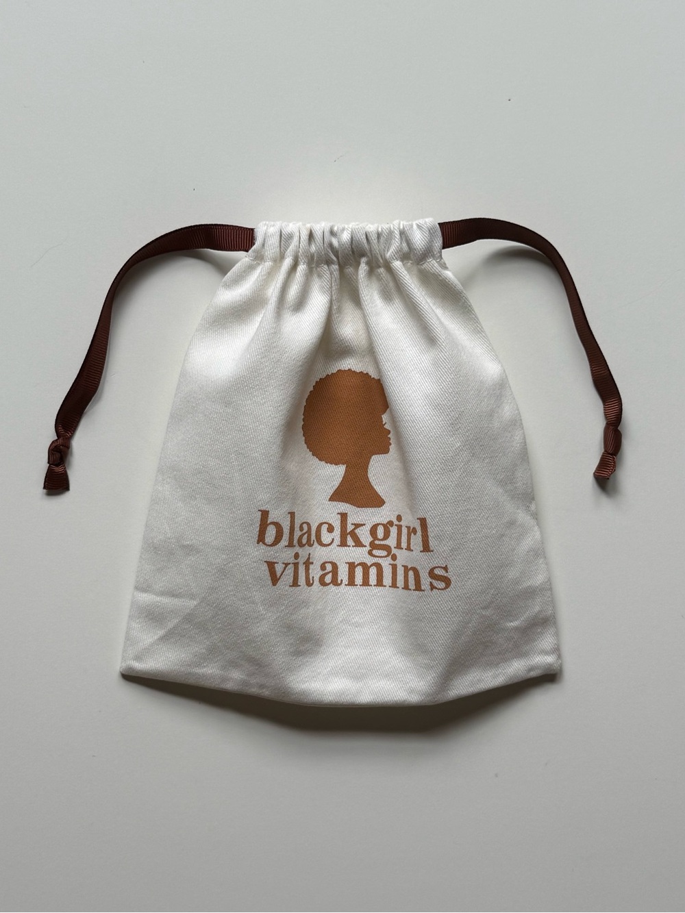 Black Girl Vitamins White Drawstring Pouch with Brown Logo